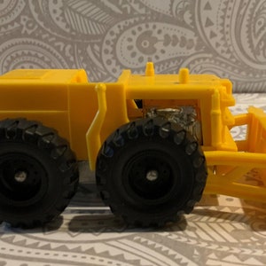 Vintage jaren 1950 Hubley Tinytoys Bulldozer - Geel plastic met metalen onderdelen - Made in the USA