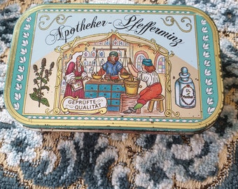 Vintage German tin, collectible Peppermint Candy Tin Apotheker Pfefferminz  Hinged Lid 3 5/8" x 2 1/4" Old Apothecary Shop Scene Heidelberg