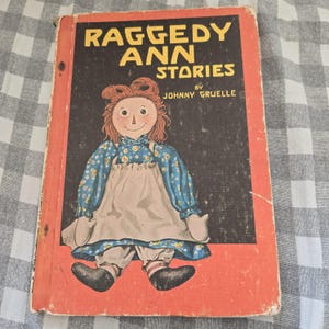 Vintage 60s Raggedy Ann Stories book Sweet Raggedy Ann Stories 1961 Edition by Johnny Gruelle Hard cover Cover and 1st pages a bit damaged