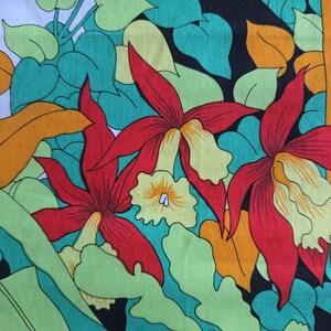 May include: A vibrant floral pattern featuring large red flowers with yellow centers and green and orange leaves. The design is set against a black and white background, creating a bold and colorful textile print.
