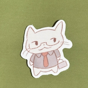 May include: A die-cut sticker featuring a cartoon cat dressed in a gray suit, red tie, and glasses, carrying a briefcase. The cat has a smiling expression and is set against a green background.