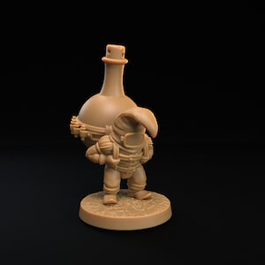 May include: A miniature figurine of a small, brown, humanoid figure wearing a helmet and carrying a large, brown, round bottle on its back. The figure is standing on a round, brown base.
