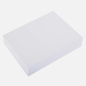 May include: A solid white rectangular block with a smooth, matte surface. The object is oriented at an angle, showcasing its top face and two visible side panels. The structure is uniform in color and features clean, sharp edges throughout.