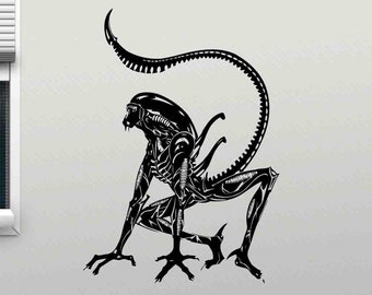 May include: Black and white silhouette of an alien creature with a long tail, standing on all fours. The alien has a skeletal, biomechanical appearance.