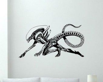 May include: Black and white illustration of an alien creature with a long tail, crawling on all fours. The alien has a long, thin head with a pointed snout and large, round eyes.