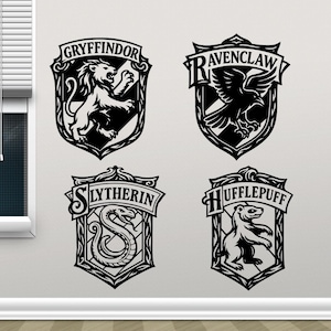 May include: Four black and white crests featuring the emblems of the Hogwarts houses: Gryffindor with a lion, Ravenclaw with an eagle, Slytherin with a serpent, and Hufflepuff with a badger. The crests are displayed on a white wall.