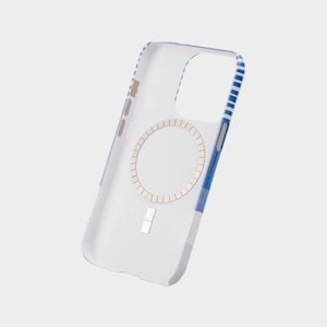 May include: A white phone case with a blue and white striped design. The case has a clear ring on the back and a magnetic strip for attaching to a car mount.