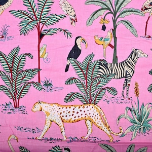 May include: Pink fabric with a repeating pattern of zebras, leopards, toucans, birds, and palm trees. The fabric has a vintage feel and is perfect for crafting projects.