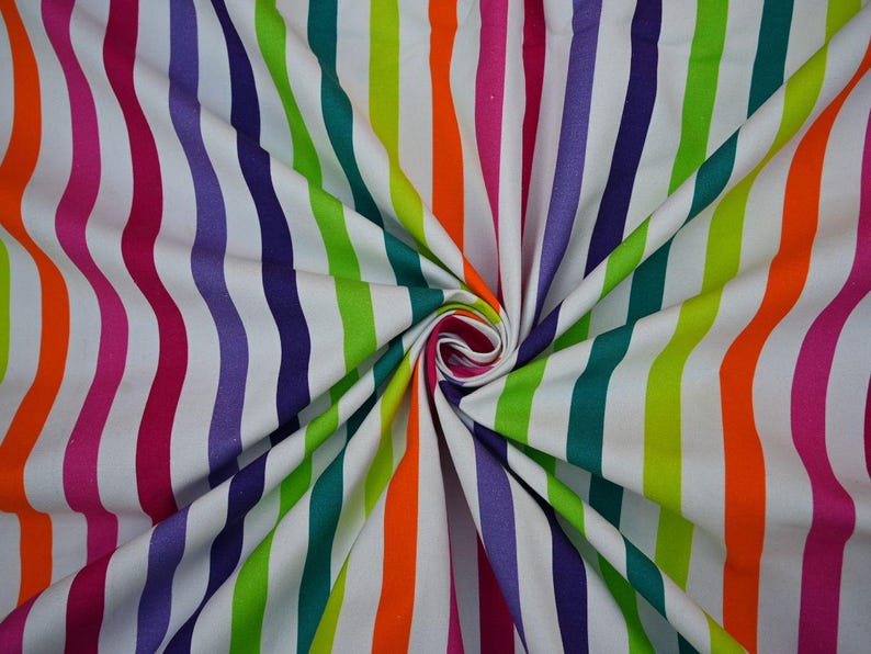 May include: A vibrant fabric with vertical stripes in a rainbow of colors, including pink, orange, green, purple, and teal, against a white background. The fabric is gathered in the center, creating a swirling pattern. This textile is suitable for various craft projects.