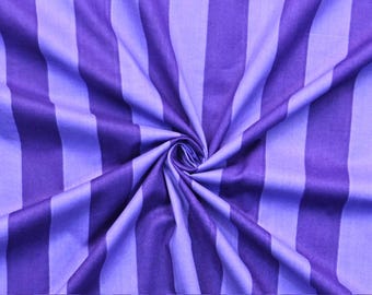 May include: A fabric featuring a repeating vertical striped pattern in alternating shades of deep purple and light lavender. The material is gathered in the center, creating a spiral effect that highlights the contrast between the two colors.