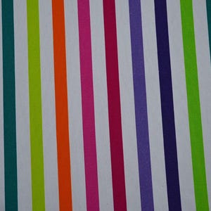 May include: A vibrant, colorful pattern featuring vertical stripes in various shades. The stripes alternate between white and bold colors like green, teal, orange, pink, purple, and navy, creating a lively and eye-catching design. This pattern is suitable for fabric or paper.