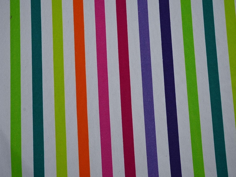 May include: A vibrant, colorful pattern featuring vertical stripes in various shades. The stripes alternate between white and bold colors like green, teal, orange, pink, purple, and navy, creating a lively and eye-catching design. This pattern is suitable for fabric or paper.