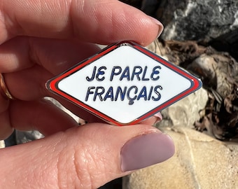 Enamel Pin: "Je parle français" (I speak French) ~ Gold or Silver Finish ~ Diamond Shape ~ In the Blue, White, and Red of France's Flag