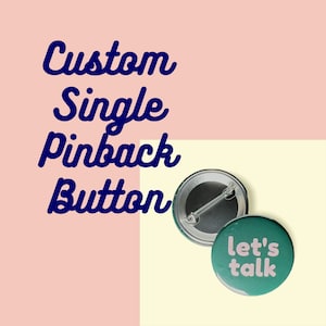 Puede incluir: Botón de solapa único personalizado con el texto "let's talk" en letras rosas sobre un fondo verde.