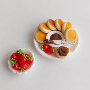 Miniature pancakes with fruit. Pancakes for doll, made of polymer clay. Food for Doll. Set of pancakes and strawberries.