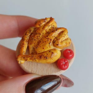A miniature chicken for a dollhouse. Food for Doll. Food on a scale of 1: 6. Realistic miniature food.
