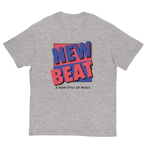 May include: A grey t-shirt with a red and blue graphic that says "NEW BEAT" and "A NEW STYLE OF MUSIC".