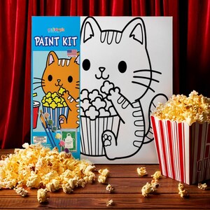 May include: A paint by numbers kit featuring a cartoon cat eating popcorn. The kit includes a canvas, paintbrushes, and paint pots. The cat is white with black outlines and the popcorn is white. The background is a red curtain.