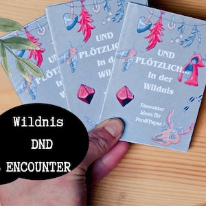 May include: Three small books with light blue covers are held in a hand. The covers feature illustrations of insects, crystals, and other natural elements. The text "UND PLÖTZLICH... In der Wildnis" is visible. A black speech bubble reads "Wildnis DND ENCOUNTER".