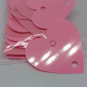 set of 27 Sequins plastic heart pink