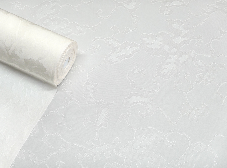 May include: A roll of white wallpaper with a subtle embossed pattern of clouds. The wallpaper has a smooth, matte finish.