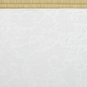 May include: White fabric with a subtle embossed pattern of swirling clouds. The fabric has a smooth, slightly textured surface.