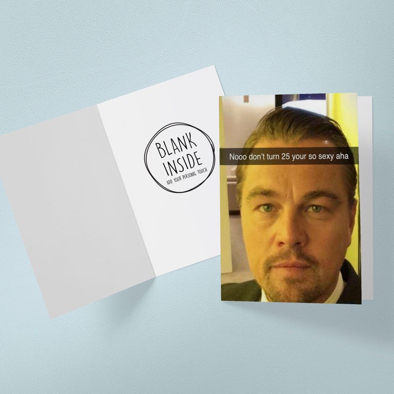 May include: A white greeting card with the text "Blank Inside" in a black circle. The card is open, revealing a photo of a man with the text "Nooo don't turn 25 your so sexy aha".