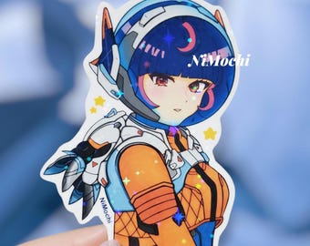 May include: A holographic sticker featuring an anime-style astronaut girl with a blue and orange spacesuit and helmet. The sticker has the text "NiMochi" and star accents.