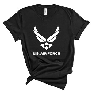 May include: Black t-shirt with a white U.S. Air Force logo and the text "U.S. AIR FORCE".
