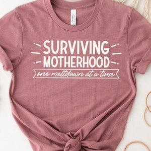 Surviving Motherhood Shirt, One Meltdown At A Time, Funny Mother's Day Shirt, Mother's Day Shirt, Mother's Day Gift, Valentines Day Shirt