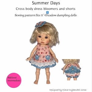 May include: A sewing pattern titled Summer Days by Dianes Doll Designs for 28 cm Meadow Dumpling dolls. The pattern features a doll wearing a pink floral dress with blue pockets and a ruffled hem, plus a matching hair accessory and bloomers.