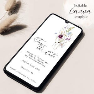 May include: A smartphone displays a wedding invitation with the text "Save the date." The invitation features floral artwork in purple, blue, and white. The text includes the names of the couple, the wedding date, and location. The top right corner reads "Editable Canva template."