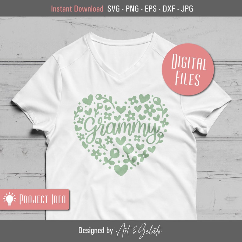 May include: A white t-shirt with a green heart design featuring the word "Grammy" surrounded by small hearts and flowers. The design is perfect for a grandmother.