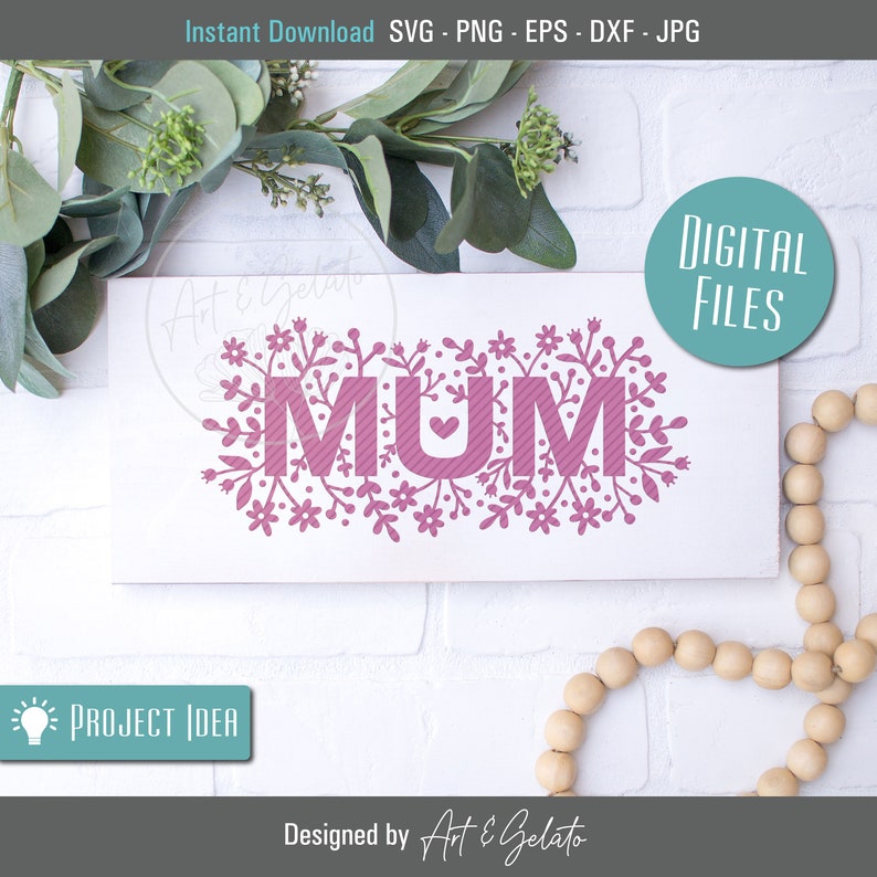 May include: Pink "MUM" text with a small heart in the middle of the "U" surrounded by a floral design. The text is on a white background.