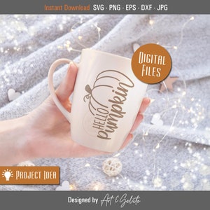 May include: A white ceramic mug with a brown graphic of a pumpkin and the text "Hello Pumpkin".