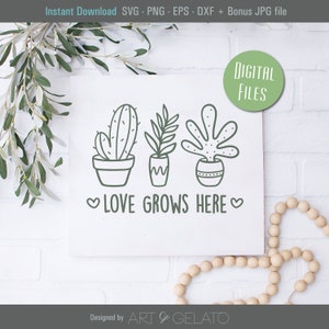 May include: A digital download of a black and white line drawing of three potted plants with the text "LOVE GROWS HERE" in a heart shape. The image is on a white background.