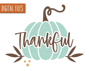 May include: A teal blue pumpkin with a brown stem and leaves. The word "Thankful" is written in brown cursive letters on the pumpkin.