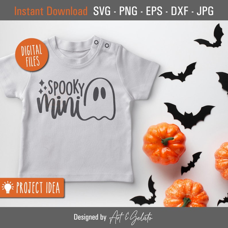 May include: A white babygrow with the text "SPOOKY mini" and a ghost graphic. The babygrow is surrounded by black bats and orange pumpkins.