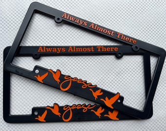 The GOOSE 2.0 Pack - raised orange lettering, made in USA from recycled plastic