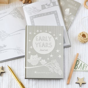 May include: A grey journal with the title "Early Years Journal" and a design of two owls on a branch with stars. The journal is for recording memories from birth up to age 5.