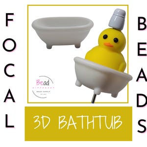 May include: A white ceramic bathtub with a yellow rubber ducky inside. The ducky is wearing a white ceramic hat. The bathtub is a 3D charm bead. The text "Bead Supply" is visible in the image.