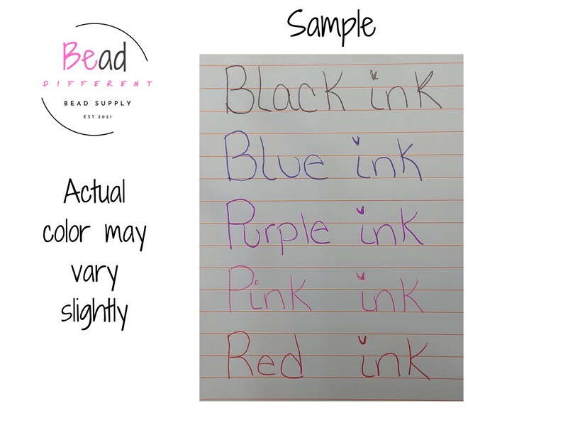 May include: A white sheet of lined paper displaying five handwritten lines of text in different colors: Black ink, Blue ink, Purple ink, Pink ink, and Red ink. The top of the page is labeled Sample, and the text Actual color may vary slightly is visible on the left side.