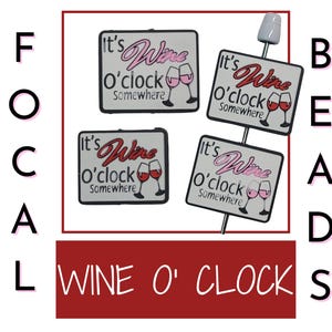 May include: Four wine bottle stoppers with the text "It's Wine O'clock Somewhere" in red and pink lettering. The stoppers are white with a black border. The stoppers are displayed on a white background.