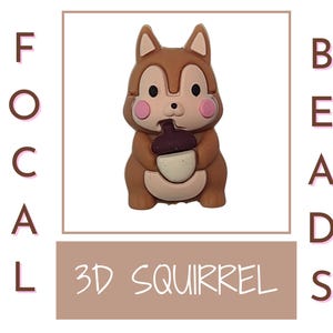 May include: A brown 3D squirrel focal bead holding an acorn. The bead is made of silicone and has a cute cartoon design.  The bead is labeled "3D Squirrel" and "Focal Beads".