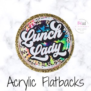 May include: Round acrylic flatback with a gold glitter border. The center features the words "Lunch Lady" in white script over a colorful tie-dye and leopard print background. The words "Acrylic Flatbacks" are at the bottom.