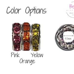 May include: Three silver rings with a row of colorful rhinestones. The rings are pink, orange, and yellow. The rings are 10mm in diameter and have a 4.5mm hole in the center. The rings are labeled "Pink", "Orange", and "Yellow".