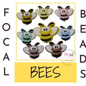 May include: A set of eight colourful bee-shaped silicone beads with black stripes and smiling faces. The beads are arranged in a circle around the word "BEADS" and the phrase "Focal Bees".