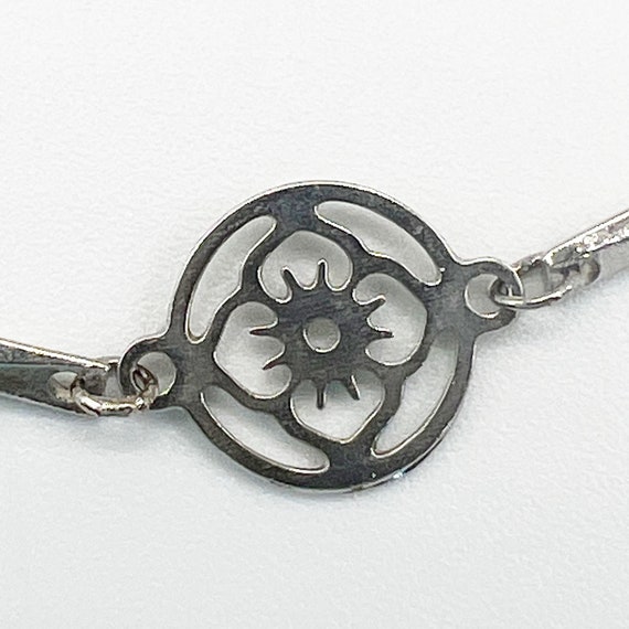 Delicate Avon cutout flowers link bracelet silver 