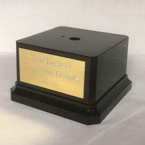 May include: Black square trophy base with a gold plate that says "Your Desired Engraving Details Here".