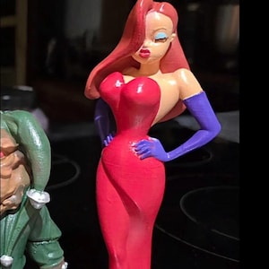 cartoon character with red dress and purple gloves Jessica Rabbit Figurine